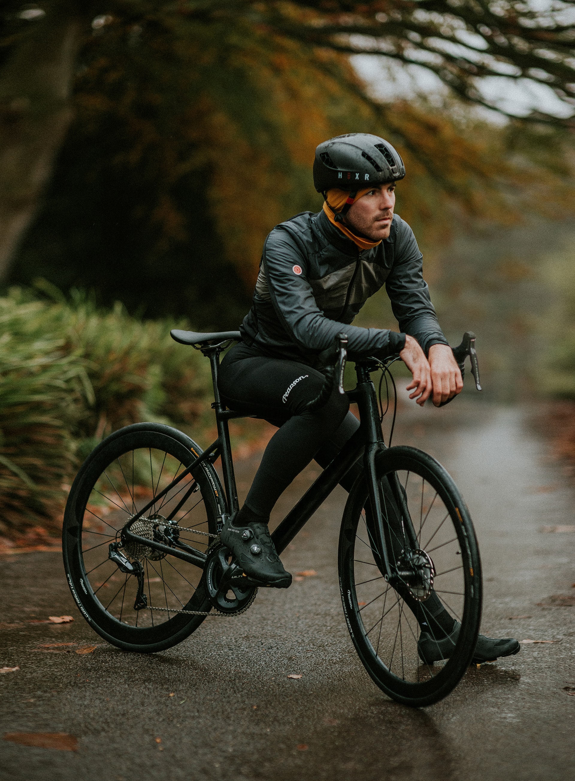 Man biking in the rain to optimize health